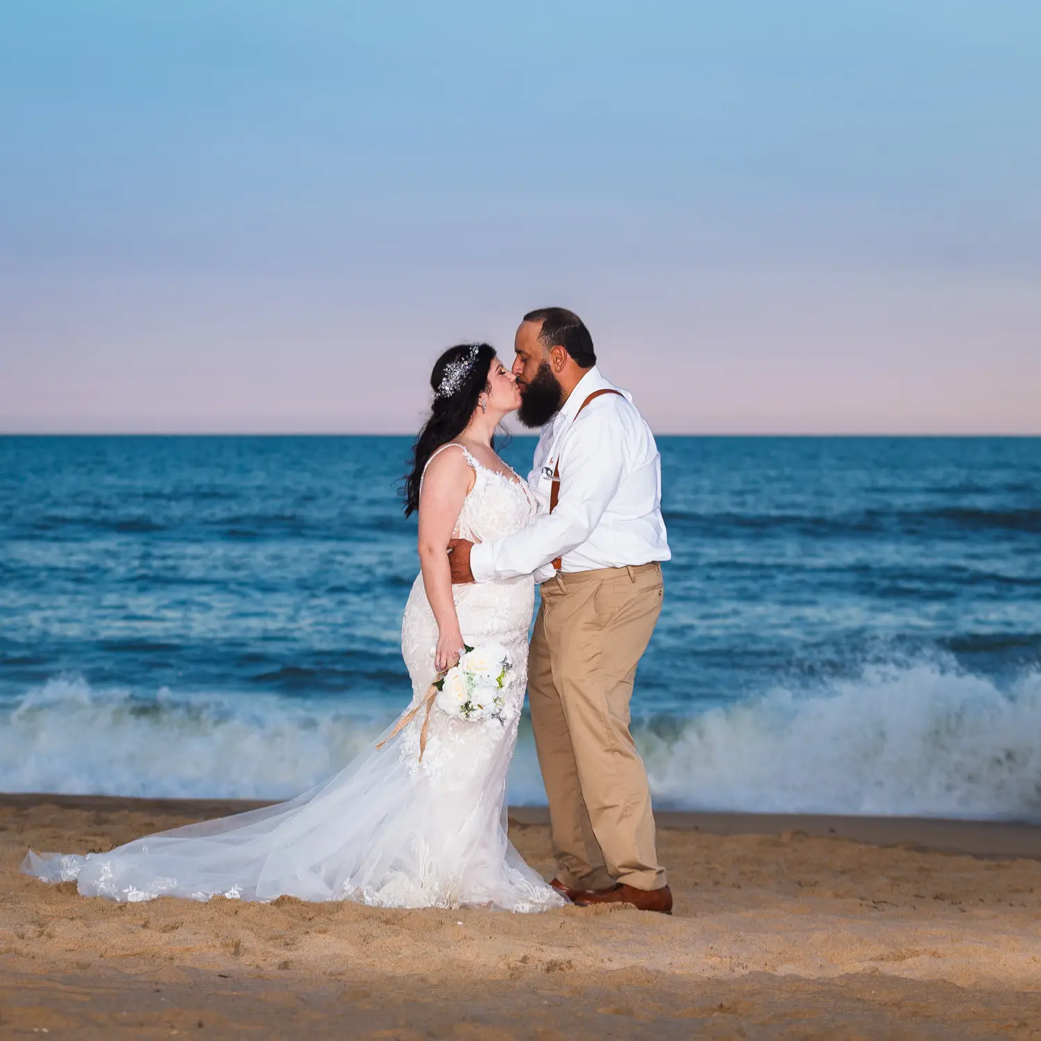 Beach wedding photographer capturing a bride and groom portrait in Virginia Beach.