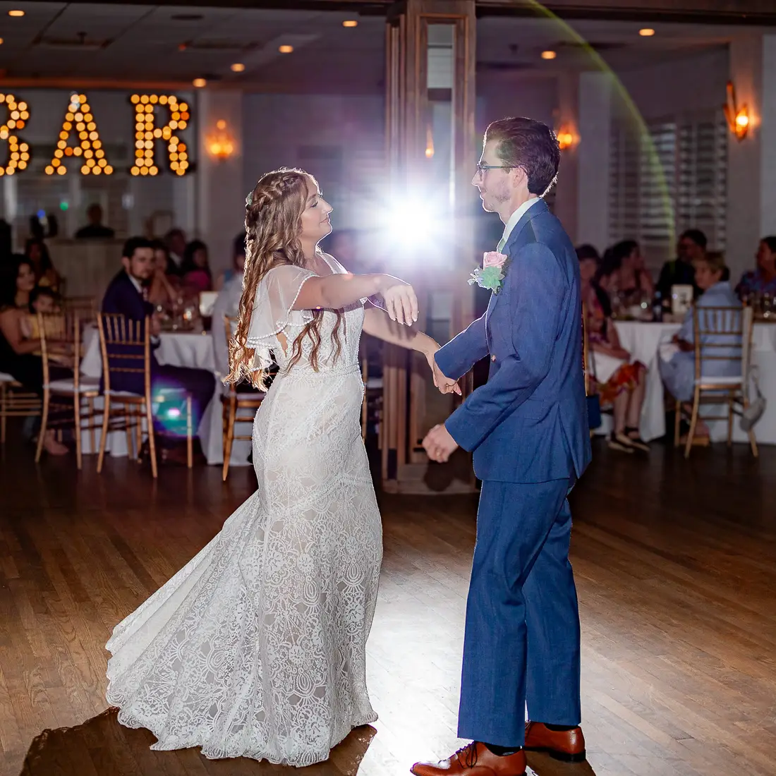 Virginia wedding photographer showcasing newlyweds' first dance captured by a coastal Virginia event photographer.