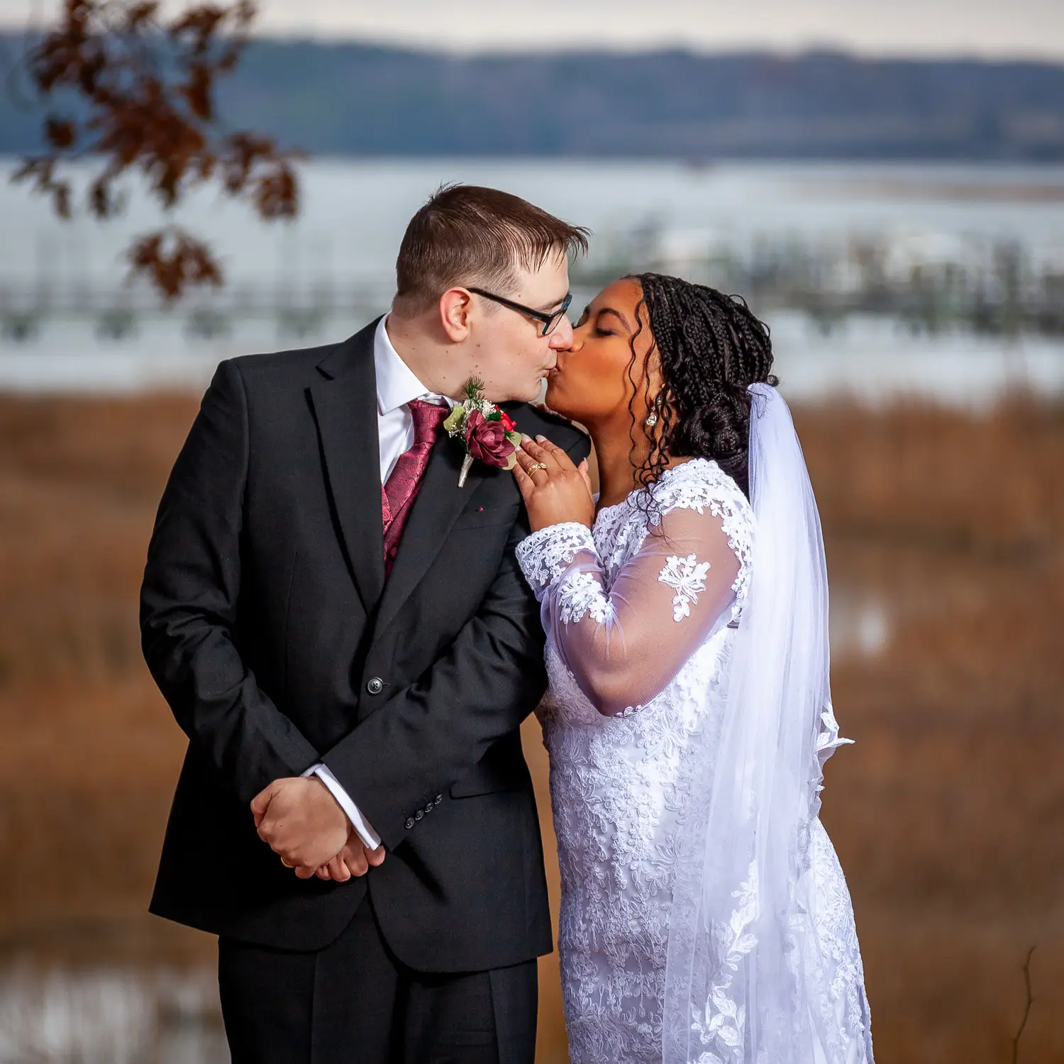 Bride and groom portrait during winter elopement in Suffolk, Virginia, by wedding photographer Ryan Clark.